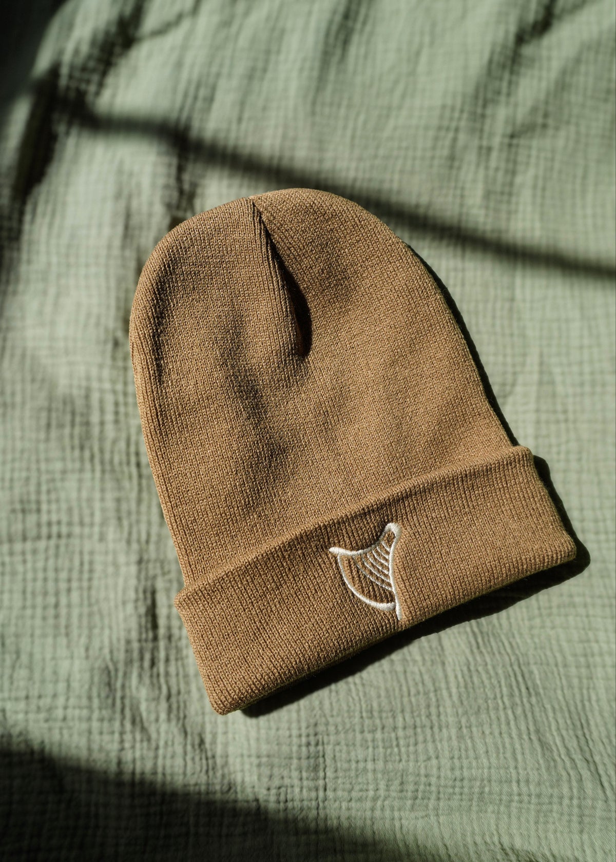 Harp Symbol Tan Beanie
